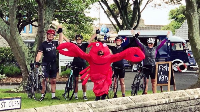 Cyclists and people in lobster suits