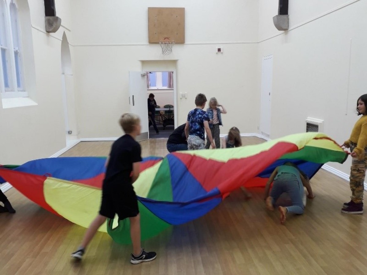 kids in a hall playing